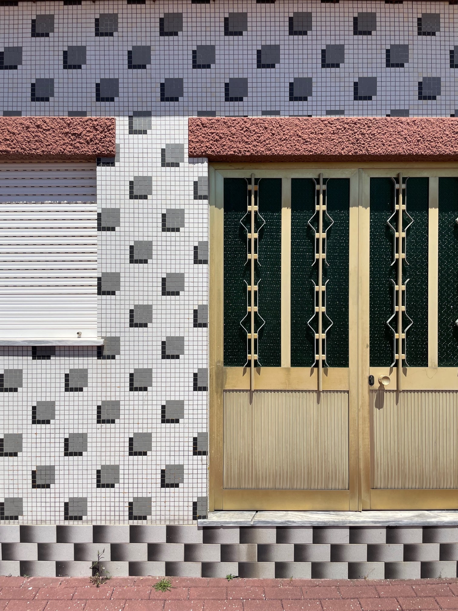 a building with abstract tile designs